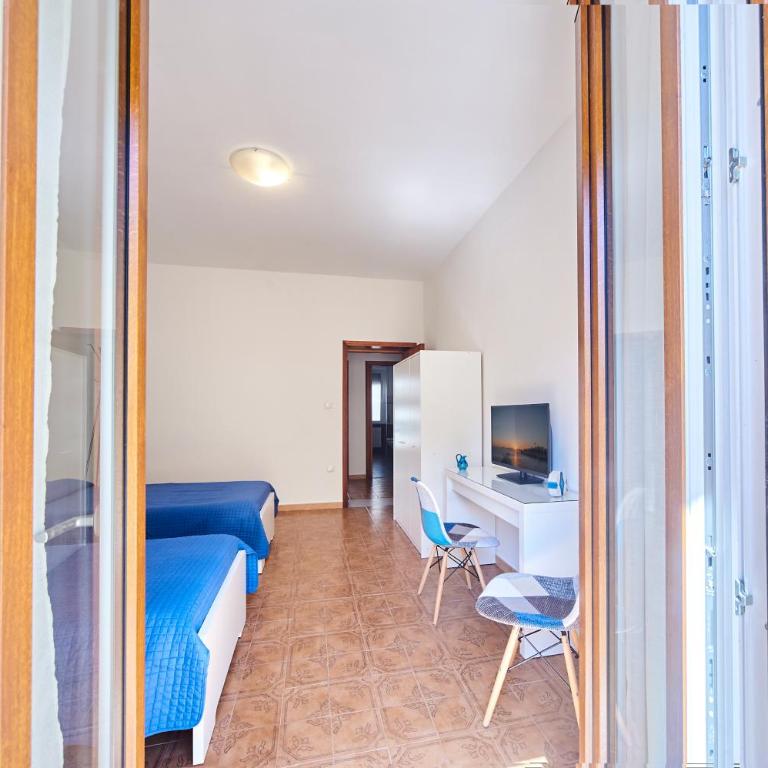 Tidu's home B&B - Camera Doppia con Letti Singoli con Servizi Igienici in Comune - 21