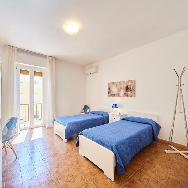 Tidu's home B&B - Camera Doppia con Letti Singoli con Servizi Igienici in Comune - 20