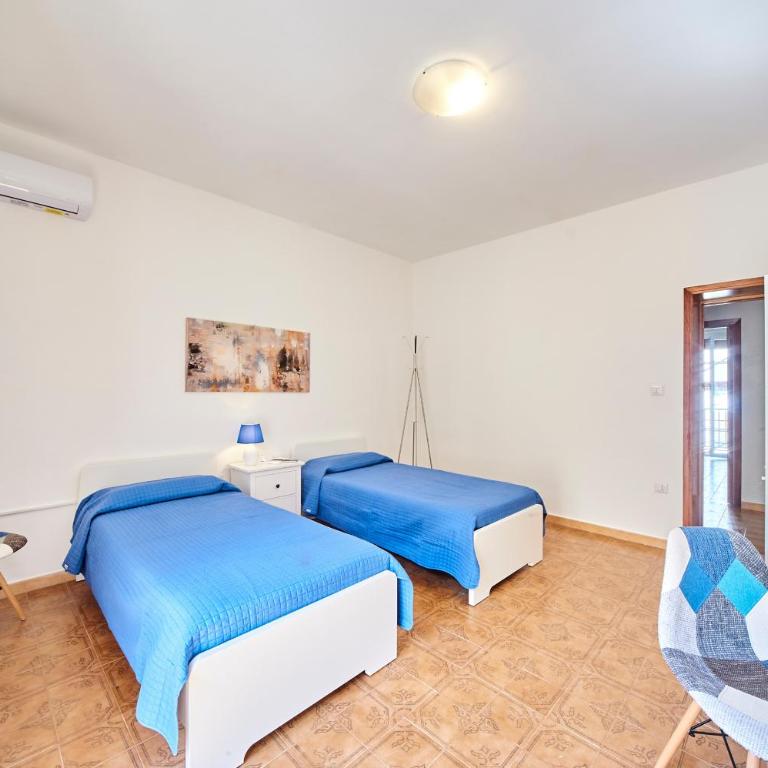 Tidu's home B&B - Camera Doppia con Letti Singoli con Servizi Igienici in Comune - 23