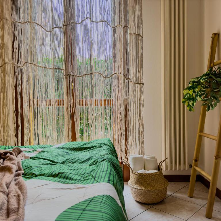 Ivy's Home - Appartamento con 2 Camere da Letto e Vista Giardino - 17