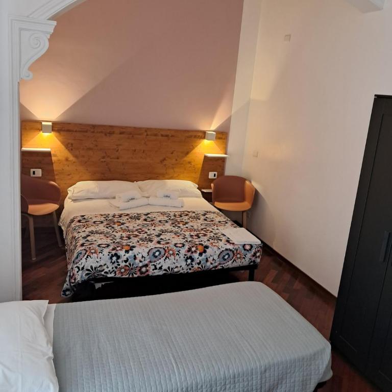 Domus Filiberto by Local Domus - Camera Tripla Basic con Bagno in Comune - 1