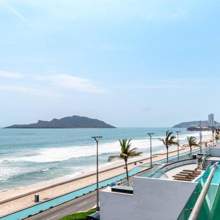 Paraíso Costero Elegante Condo con Vista al Mar - Two-Bedroom Apartment - 13