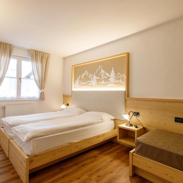 Residence Montebel - Camera Familiare Superior - 18