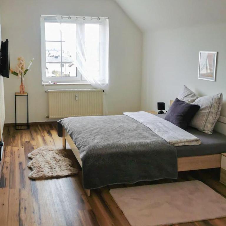 Ferienwohnungen Herschel - Apartment mit 1 Schlafzimmer und Gartenblick - 3