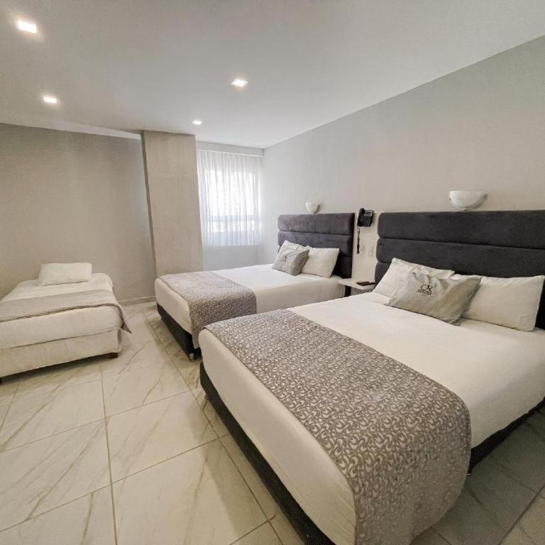 Hotel OR Suite - Habitación Triple Confort - 1