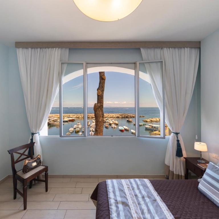 Sea Breeze Residence - Camera Familiare con Vista Mare - 1