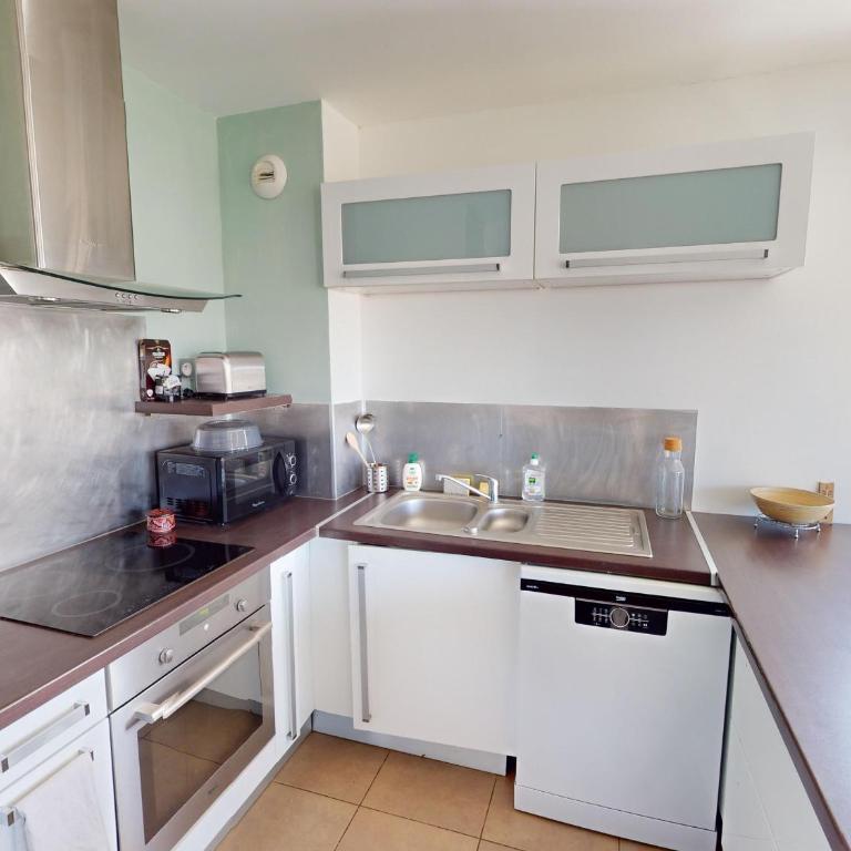 Frontignan : Appartement 2 pièces avec terrasse, parking, proche plage et commerces - FR-1-785-5 - Appartement - 11