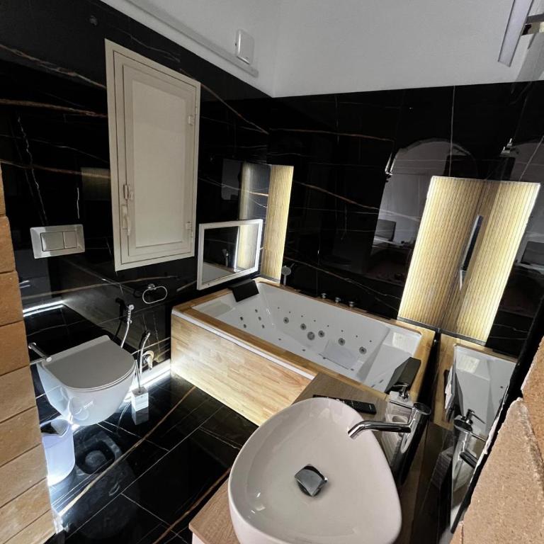 AG SUITE TRAPANI - Suite Deluxe con Vasca Idromassaggio - 14
