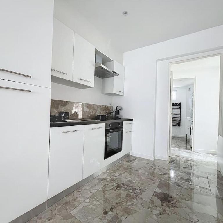 Élégant T2 avec Jardin Central - Apartamento de 1 dormitorio - 8
