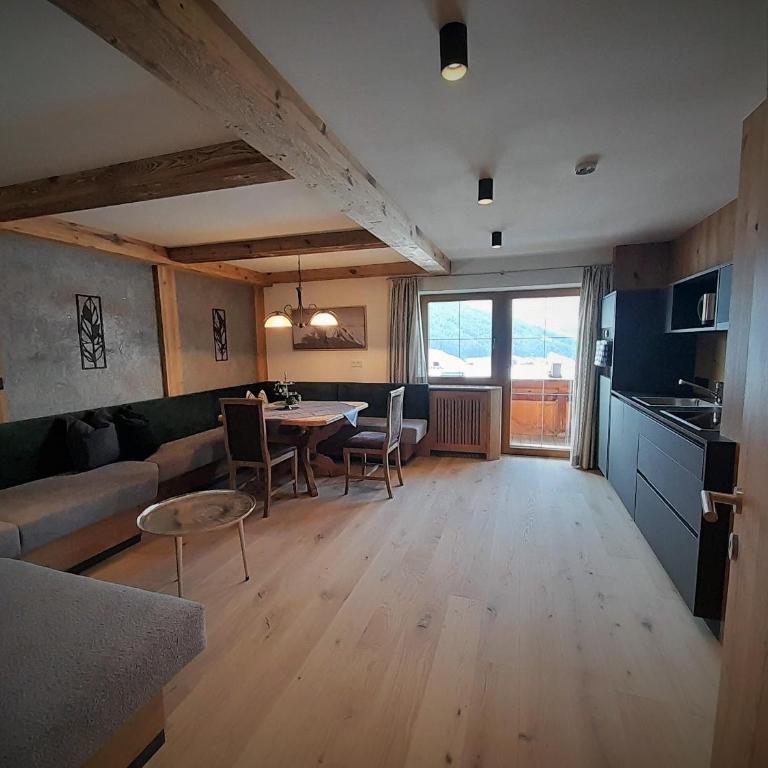 Alpengasthof Rossmoos - Apartment mit 3 Schlafzimmern und Bergblick - 12
