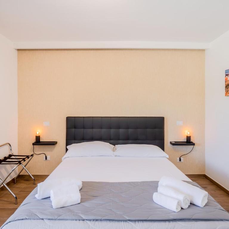 Pietramare Luxury Suites - Family Room with Garden View - 29