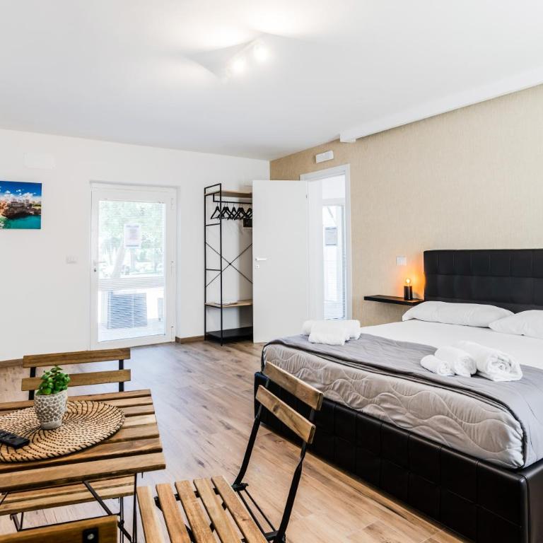 Pietramare Luxury Suites - Family Room with Garden View - 23