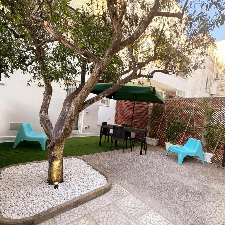 B&B Primalba - Camera Familiare con Vista Giardino - 8