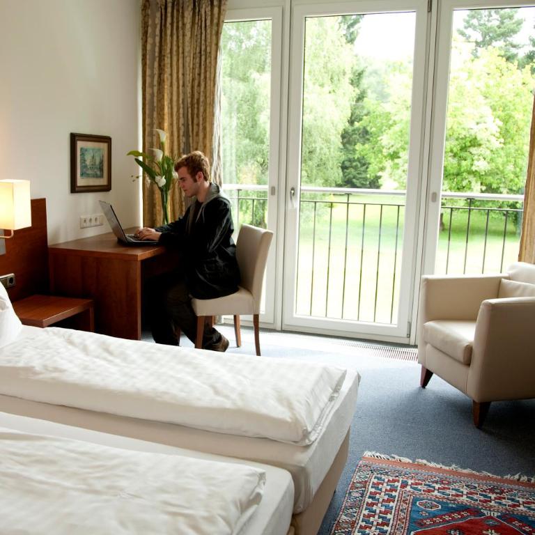 Hotel Alhartinger Hof - Apartment mit Gartenblick - 1