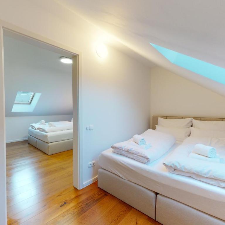 YUVA HOMES am Kurpark - BRIGHT Collection - Apartment mit 2 Schlafzimmern und Gartenblick - 1