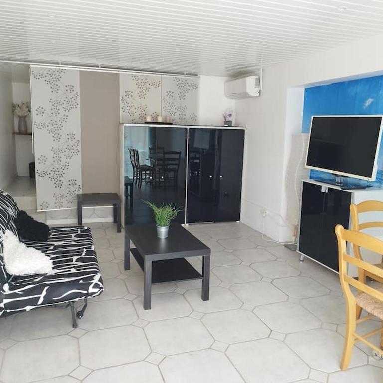 Bas de villa climatisé avec coin terrasse - Apartment mit 1 Schlafzimmer - 1