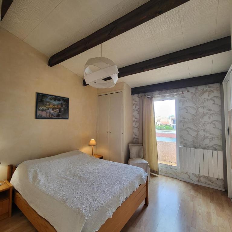 VILLA AUX CAPELLANS SUR LA MARINA POUR 4 PERSONNES - vue Marina - Parking - plage à 5 min à pied - Two-Bedroom House - 14