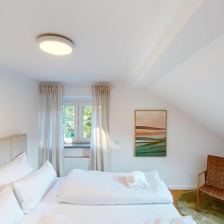 YUVA HOMES am Kurpark - BRIGHT Collection - Apartment mit 2 Schlafzimmern und Gartenblick - 25