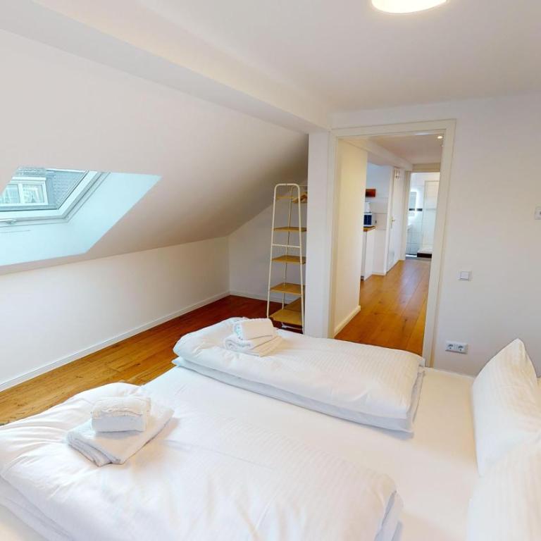 YUVA HOMES am Kurpark - BRIGHT Collection - Apartment mit 2 Schlafzimmern und Gartenblick - 23