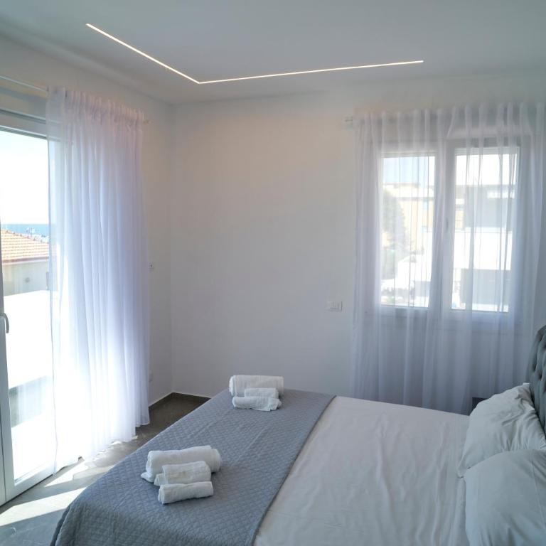 Villa Borghesi Suites Fronte Mare - Appartamento con 2 Camere da Letto e Balcone - 11