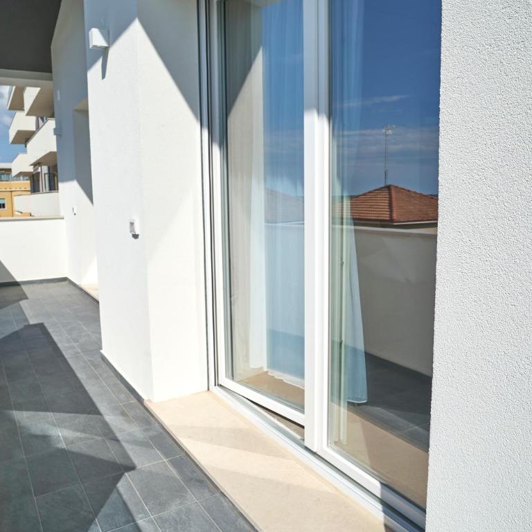 Villa Borghesi Suites Fronte Mare - Appartamento con 2 Camere da Letto e Balcone - 18