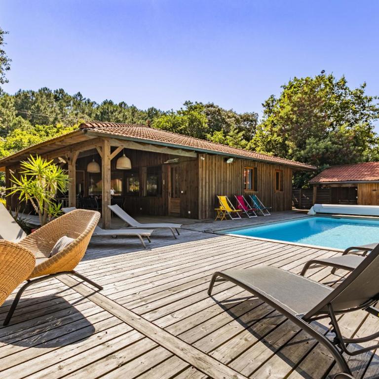 villa bois typique du bassin avec piscine chauffée au bord du lac, La Gde Escoure - Villa mit privatem Pool - 1