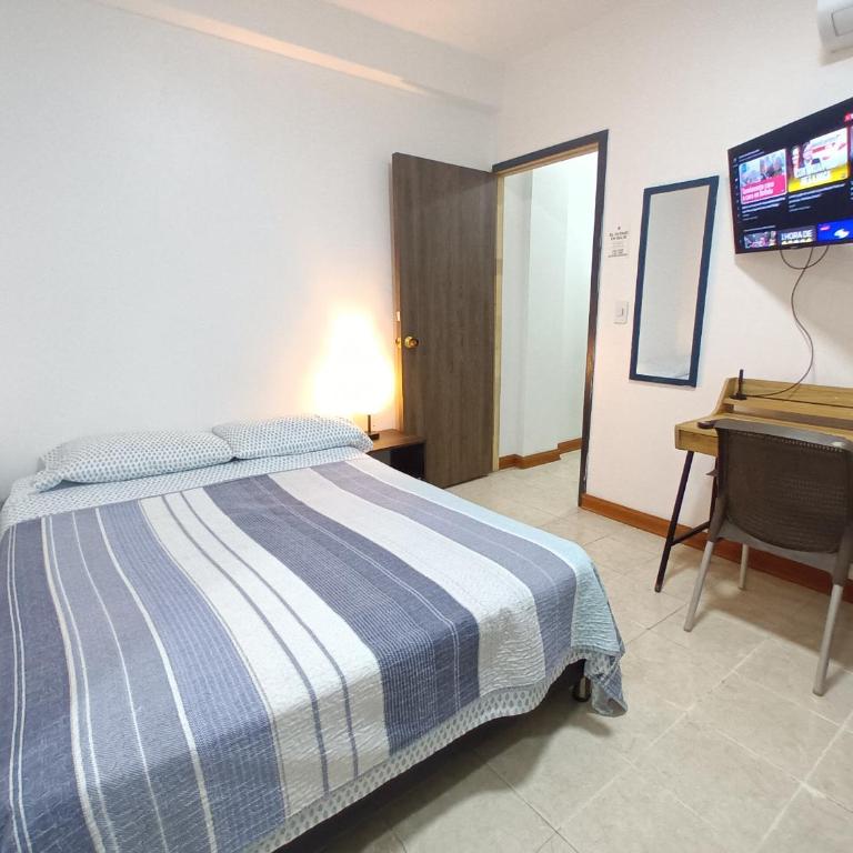 Habitación confortable y central a 100mts de la playa - Triple Room with Private Bathroom - 5