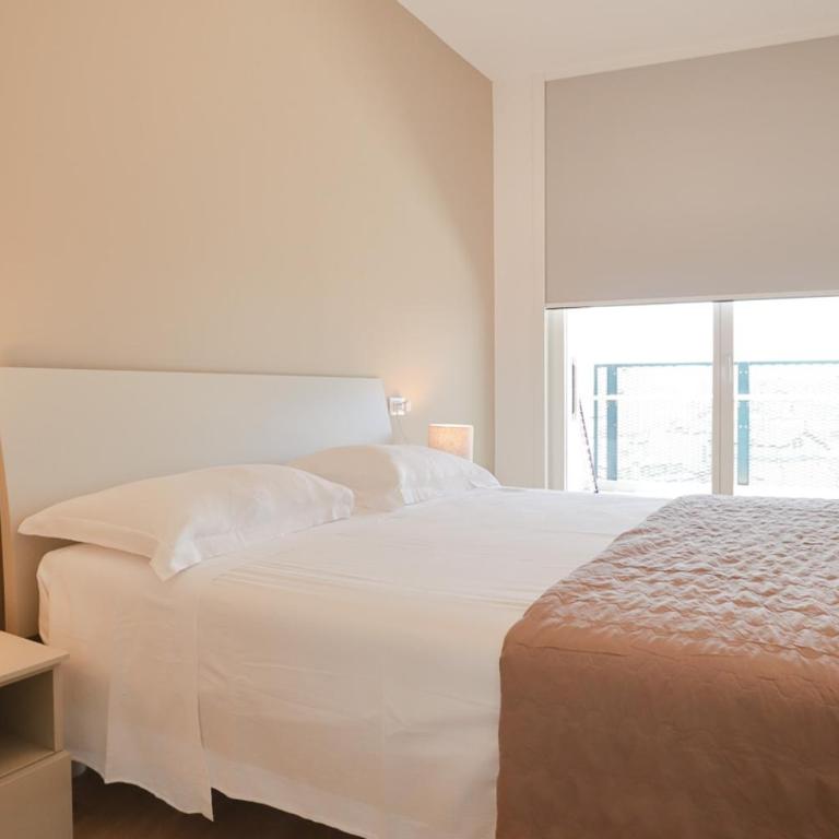 Podium - QUI VENDE Immobiliare - per solo Famiglie - Appartamento con 2 Camere da Letto - 33
