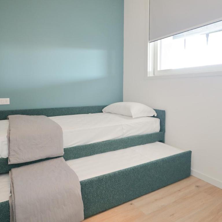 Podium - QUI VENDE Immobiliare - per solo Famiglie - Appartamento con 2 Camere da Letto - 23