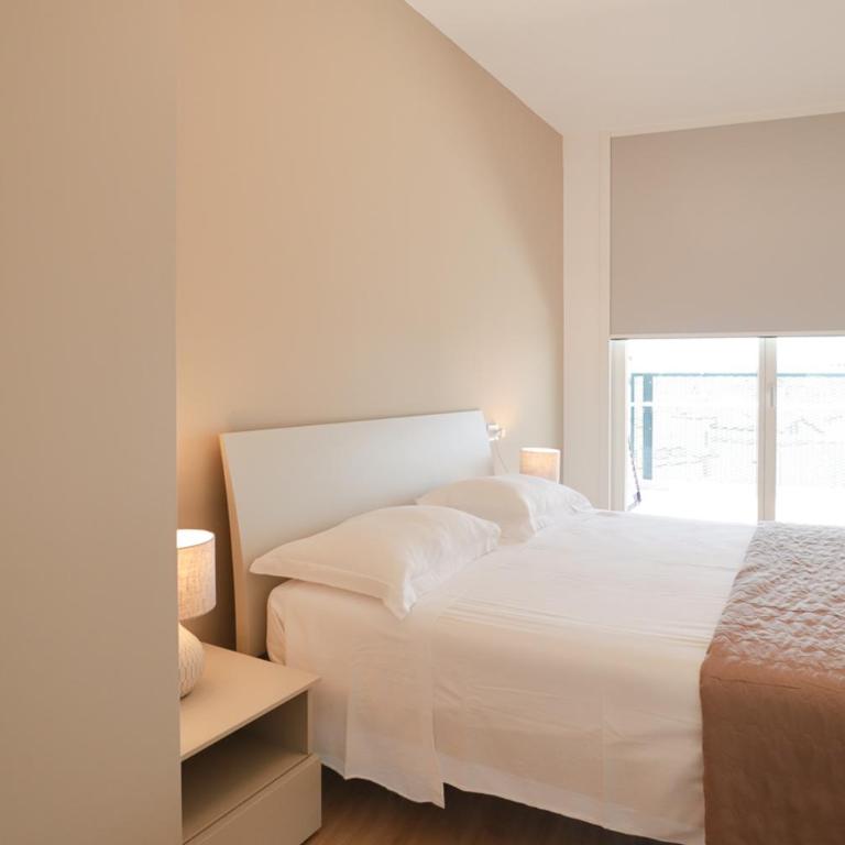Podium - QUI VENDE Immobiliare - per solo Famiglie - Appartamento con 2 Camere da Letto - 36