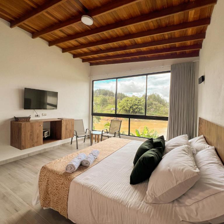 Viajero Guatapé Hostel & Lake Club - Habitación Doble con bañera de hidromasaje - 5