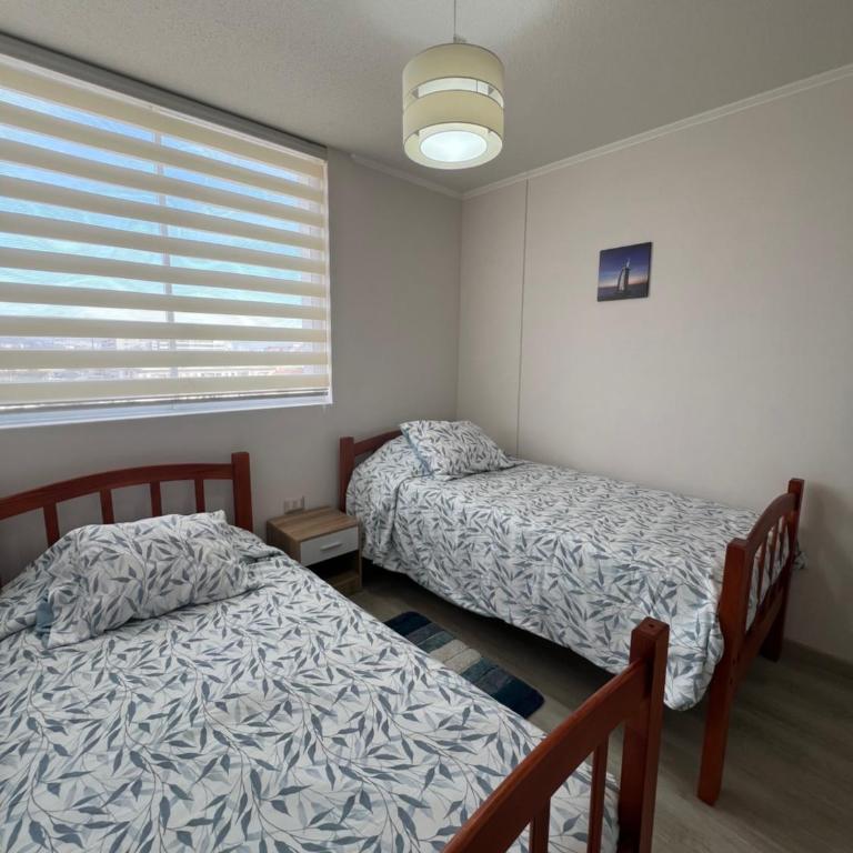 Cómodo departamento a pasos de la playa - Two-Bedroom Apartment - 17