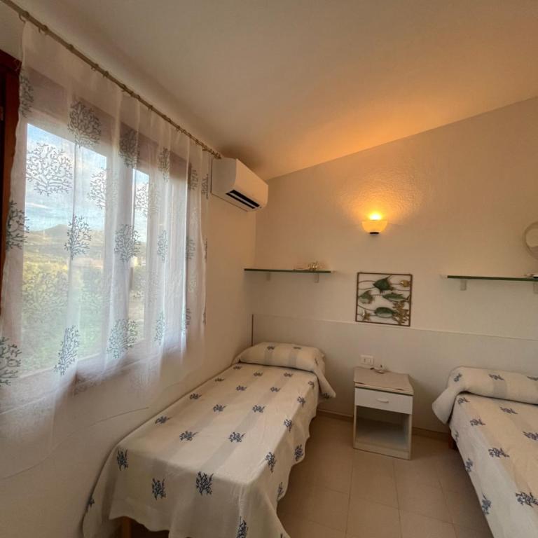Villetta MP casa sviluppata su due piani con doppia veranda e parcheggio privato - Appartamento con 2 Camere da Letto - 24