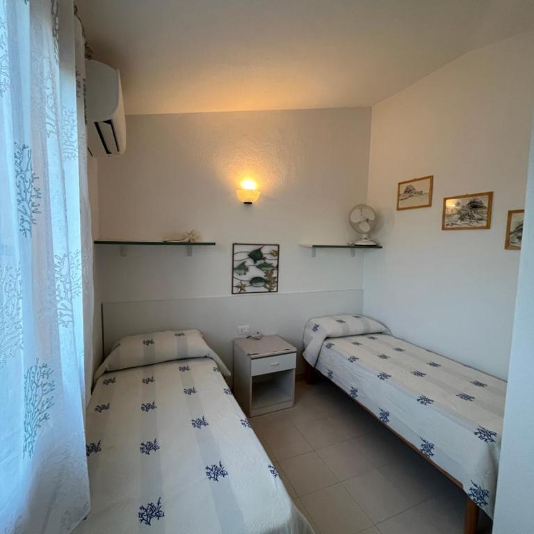 Villetta MP casa sviluppata su due piani con doppia veranda e parcheggio privato - Appartamento con 2 Camere da Letto - 36