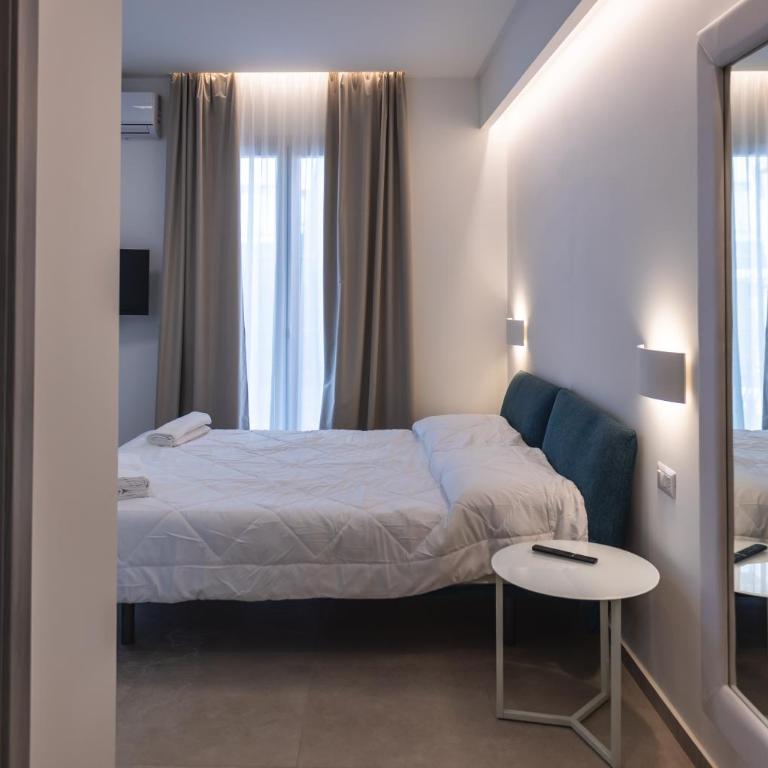 Atena Room - Camera Quadrupla con Balcone - 1
