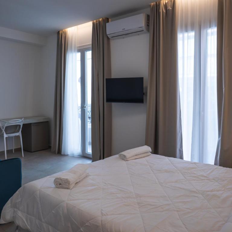 Atena Room - Camera Quadrupla con Balcone - 5