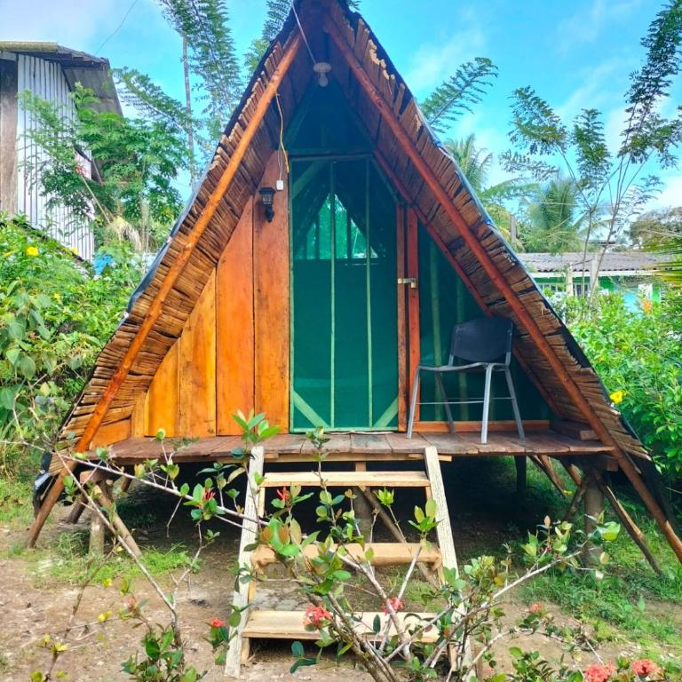Wira Pora Hostal - Habitación Triple con vistas al jardín - 1