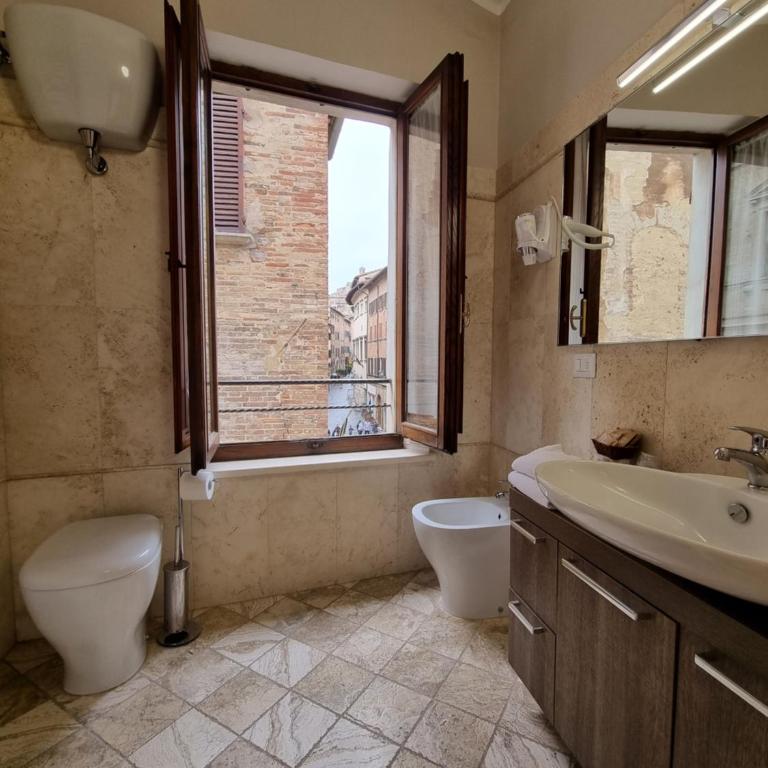 Albergo Il Marzocco - Hotel dal 1860 - Camera Matrimoniale/Doppia con Letti Singoli con Vista Città - 11