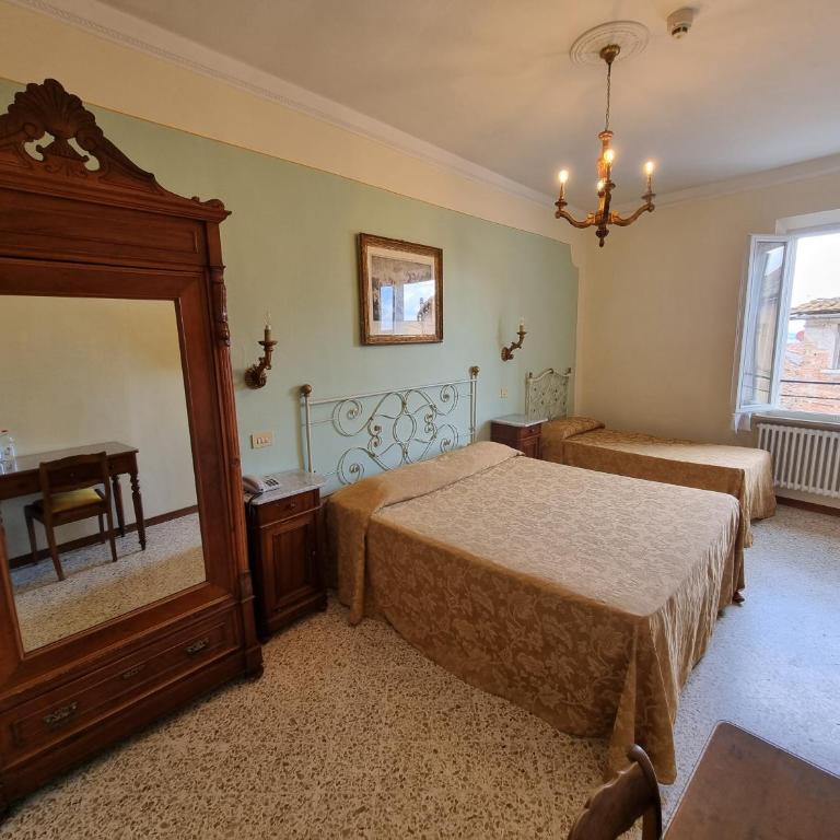 Albergo Il Marzocco - Hotel dal 1860 - Camera Tripla con Vista Città - 3