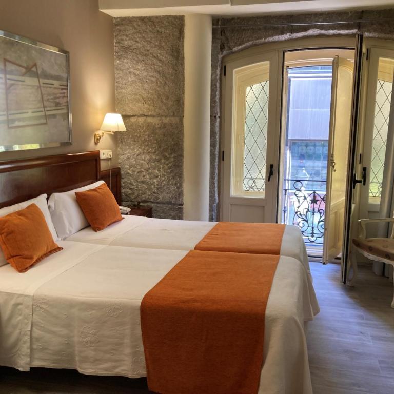 Hostal San Lorenzo - Habitación Doble con vistas a la ciudad - 1 o 2 camas - 5