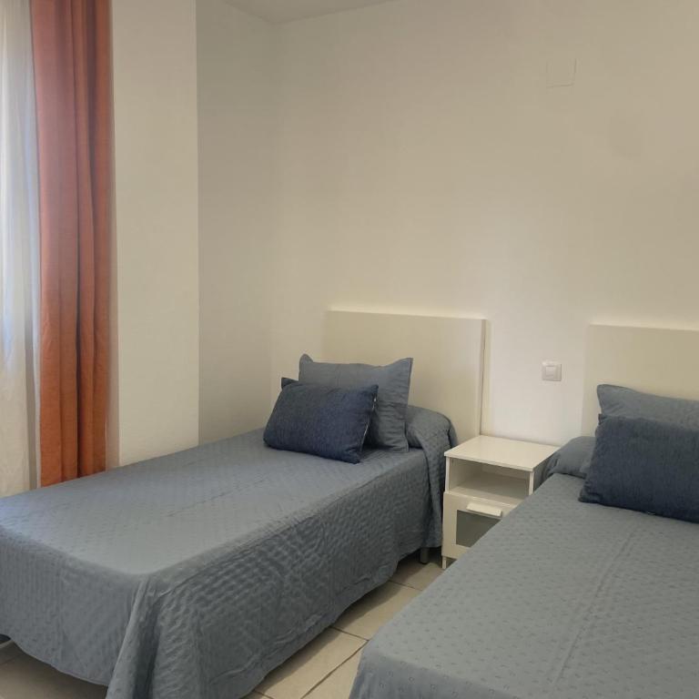 APARTAMENTO BAJO TERRAZA URBANIZACION ACCESO DiRECTO PLAYA - Apartamento de 2 dormitorios - 13
