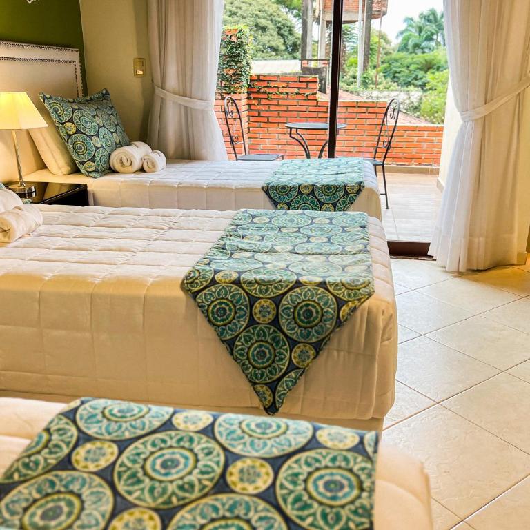 Mburucuyá Hotel Boutique - Triple Room with Balcony - 4