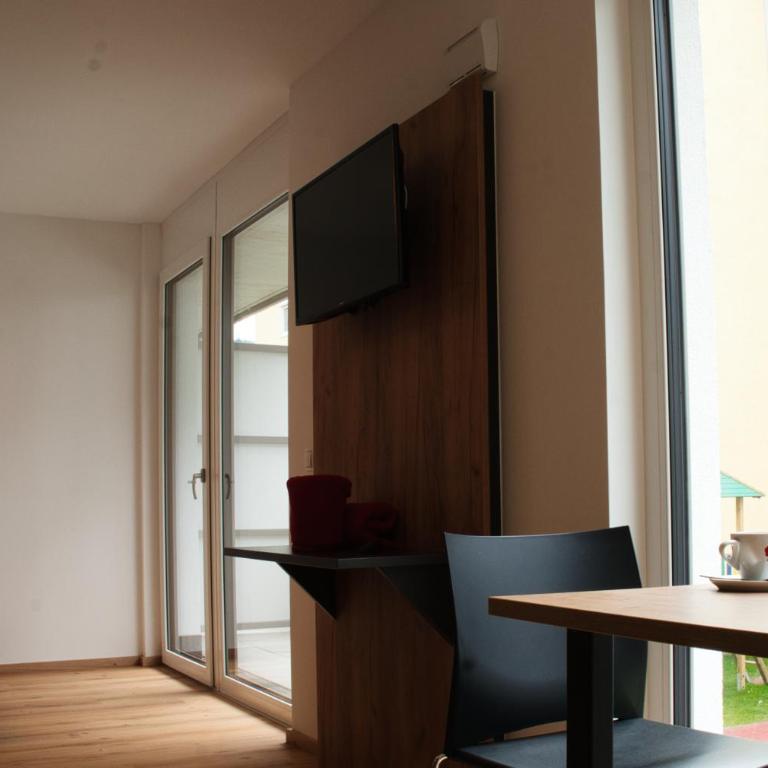myQuartier City Chalets digital self check in - Studio M mit Balkon - 3