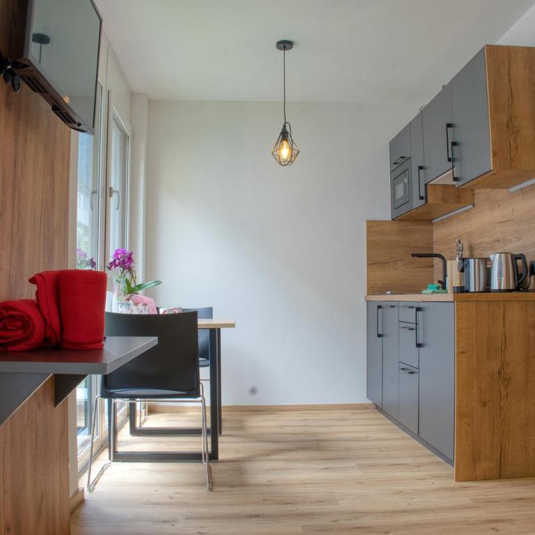 myQuartier City Chalets digital self check in - Studio M mit Balkon - 6