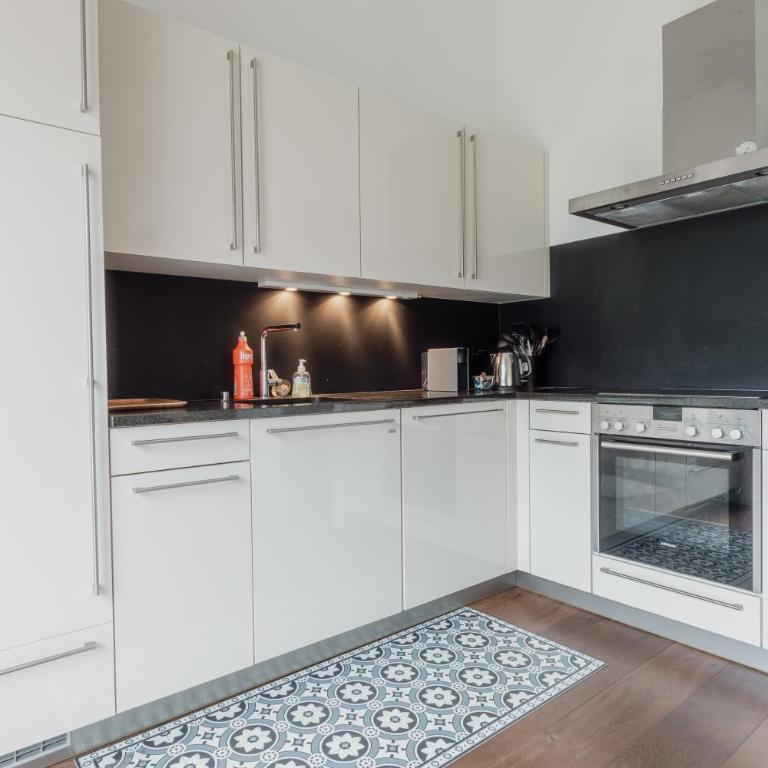 Magnifique appartement central avec vue dégagée - Apartment mit 2 Schlafzimmern - 15