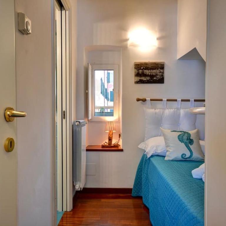 La Nicchia sul porto- Piccolo appartamento vista a mare a un passo dalle spiagge - 4 posti letto - Appartamento con 1 Camera da Letto - 15