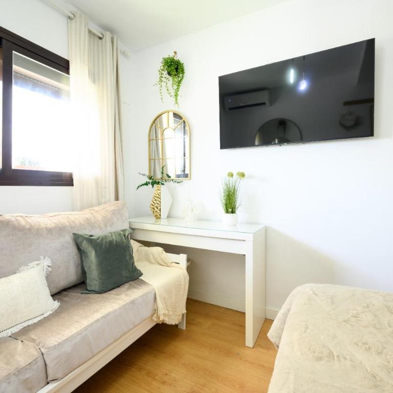 Estudio con parking Teatinos Málaga living - Apartamento de 1 dormitorio - 6