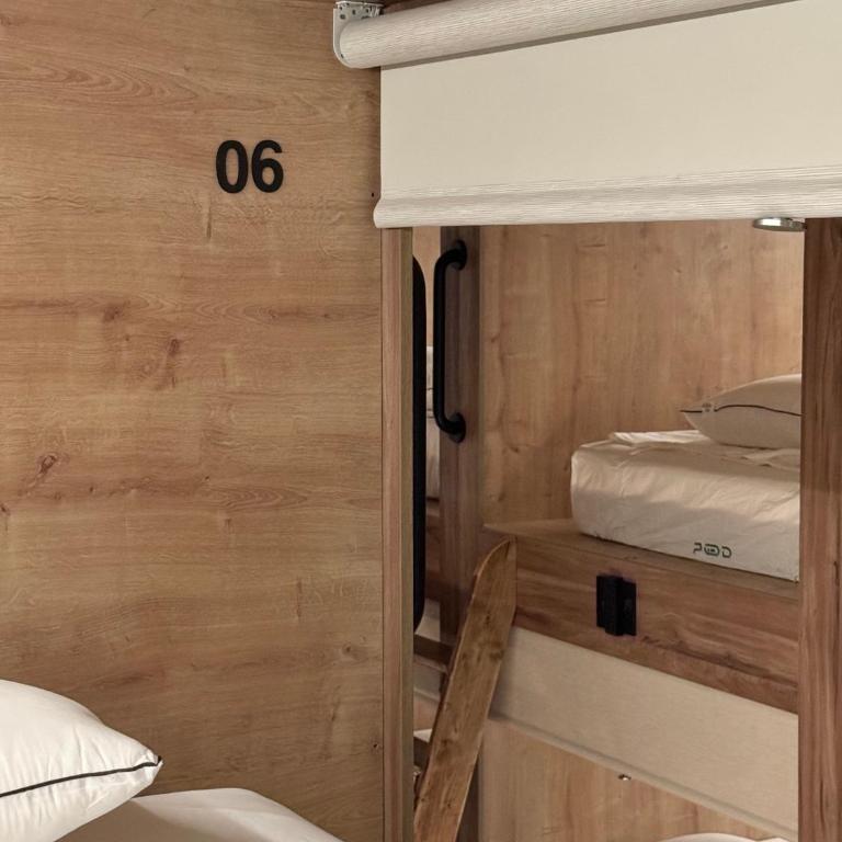 The POD Suite Hostel Village - B06 Mixed Upper bed in Shared Room with 20 beds - 3