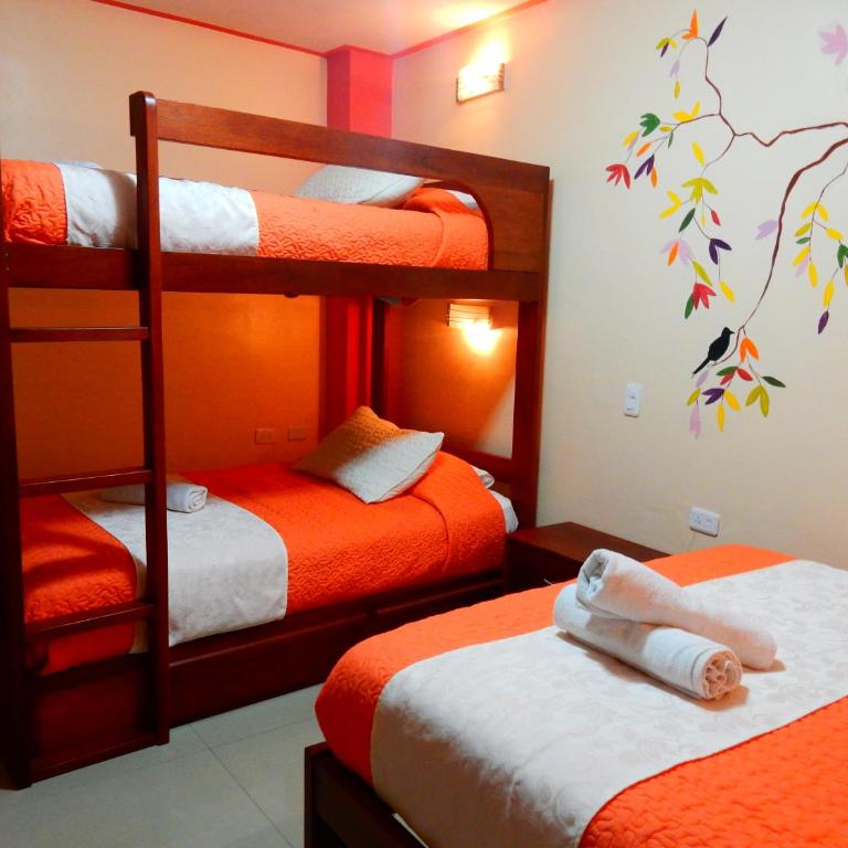 Hostal Dulce Amanecer - Habitación cuádruple - 1