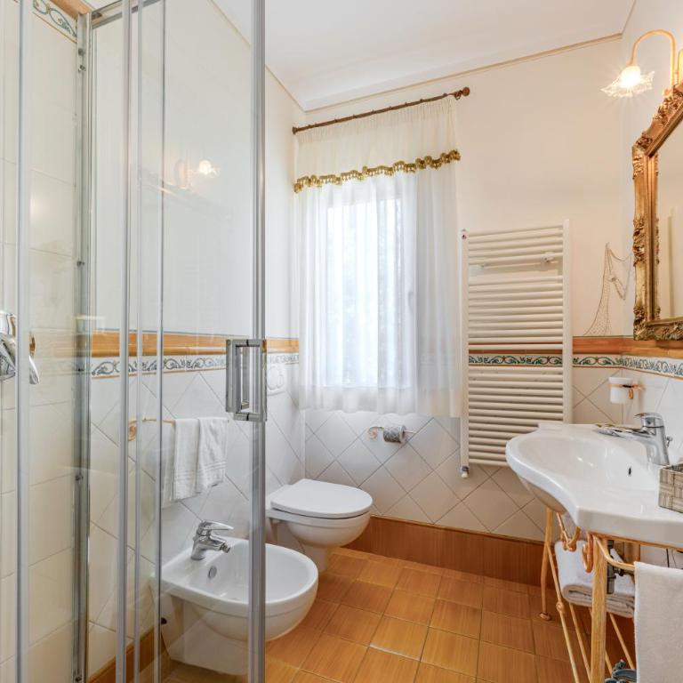 Villa Capitorsola - Quadruple Room with Garden View - 4